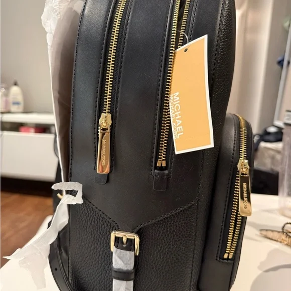 Black Leather Backpack with Gold Accents